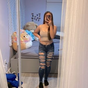 American Eagle Mid Waist Distressed Skinny Jeans